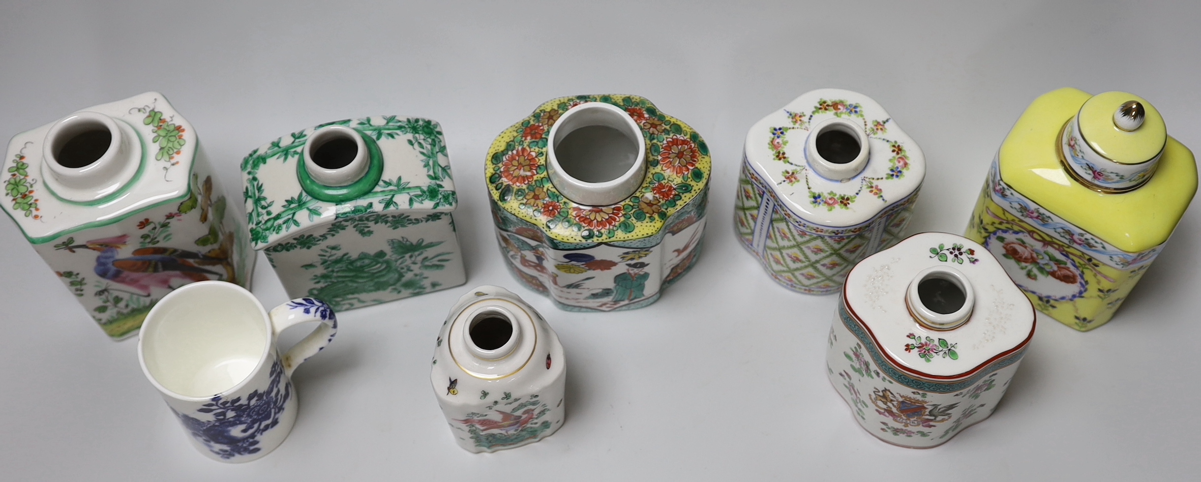A group of seven floral Continental tea canisters (one with cover) and a Worcester style bone china mug, the largest 15.5cm high